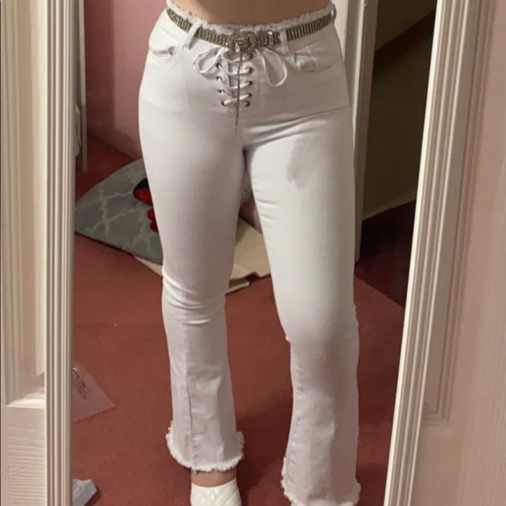white lace up jeans